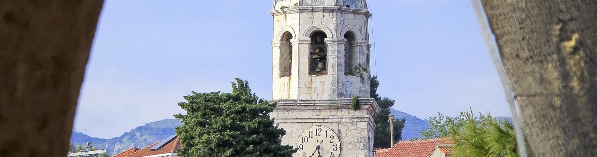 Tower at Cavtat Harbor in Dalmatia.jpg